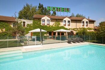 L'Hôtel des Trois Massifs L'Hôtel des Trois Massifs