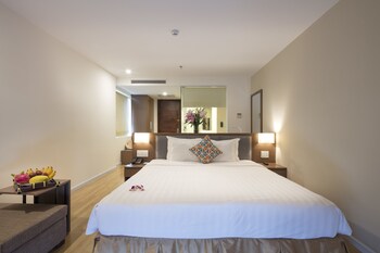 Pokój dwuosobowy z 1 lub 2 łóżkami typu Deluxe, balkon, widok na miasto